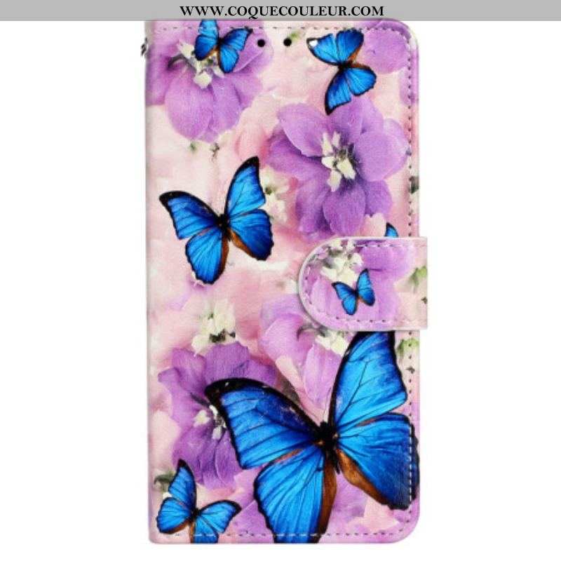 Housse iPhone 15 Plus Petits Papillons Bleus à Lanière