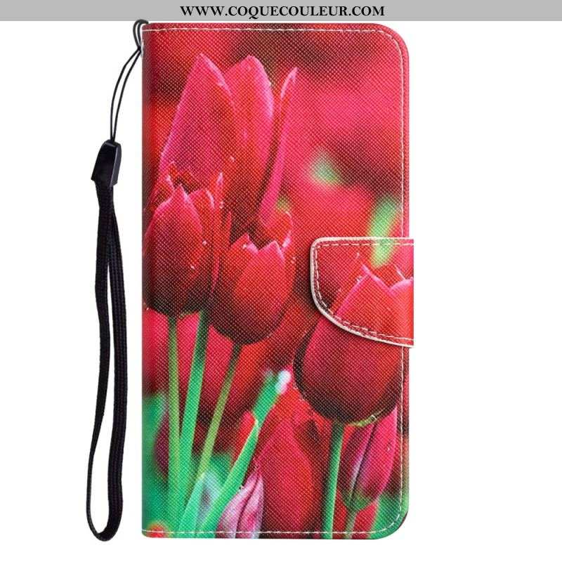 Housse iPhone 15 Déclinaison Florale à Lanière